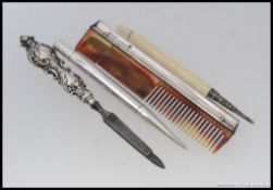 A collection of silver items (some hallmarked, some 925, some unmarked) to include a pencil, comb,