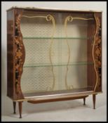 A retro 1950's china display cabinet.