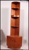 A retro 1970's teak wood corner cabinet.