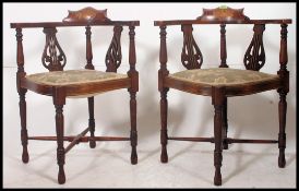 A pair of Edwardian mahogany marquetry inlaid corner chairs, twin splats,