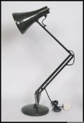 A vintage retro industrial Herbert Terry anglepoise lamp light in khaki green colour. 85cm tall.