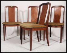 A set of 4 1970's retro teak and oak quarter veneer dining chairs.