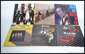 A small collection of vinyl long play records to include Adam and the Ants ' Friend or Foe ',