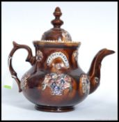 A large  Mearshaum  type  Bargeware majolica pottery teapot.