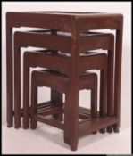 A 20th century Chinese hardwood 1950's quartetto nest of tables.