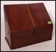 A Victorian walnut stationary / metamorphic desk tidy.