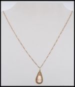 A 20th century 9ct gold vintage ladies necklace and cameo pendant.