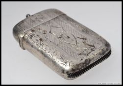 A silver hallmarked vesta with assay marks for Birmingham dated 1902 by William Hair Haseler. 32.