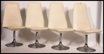 A set of 4 original Borje Johnanson retro leather and chrome tulip dining chairs.