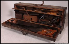 An early 20th century toolbox with contents.