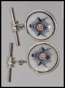 A pair of white metal 925 silver and enamel masonic cufflinks.