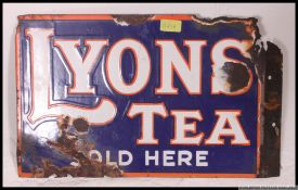 A fabulous original vintage enamel Double sided Industrial advertising Lyons tea sign ( see
