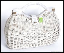 A retro vinyl rattan  woven handbag,