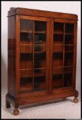 A 1930's good quality oak display cabinet.