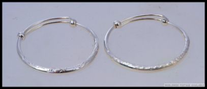 2 silver 999 proof childrens christening bands.