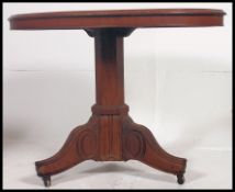 A Victorian mahogany circular centre table.