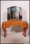 A 1930's Art Deco birds eye maple dressing table.