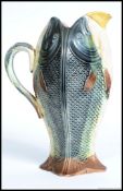 A 19th century rare Four sided Majolica jug pitcher in the form of a fish / sardine.