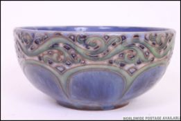A 19th century Doulton Lambeth Art Nouveau blue glaze bowl.