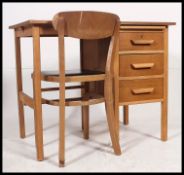 An air ministry light oak single pedestal desk,