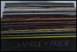 A collection of long play country and western vinyl records by various artists to include Charlie