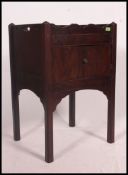 A Georgian 19th century mahogany tray top night cupboard / bedside cabinet.