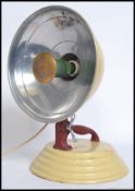 A vintage mid century ' The Barber ' metal Industrial heat lamp ideal for conversion as a desk lamp