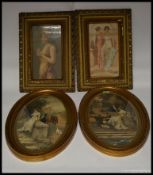 A pair of early 20th century prints of classical scenes set in gilt oval frames.