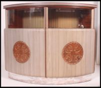 A 1970's retro vinyl upholstered cocktail - drinks bar with window top,
