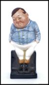 A small Royal Doulton Large early figurine entitled ' Fat Boy '  bearing green back stamp to base.