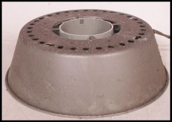 A vintage 20th century industrial multi faceted overhead factory light.