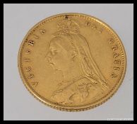 An 1887 half sovereign gold coin bearing Queen Victoria - Jubilee bust ( see illustrations ) Weight