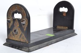 A 19th century Regency rosewood, brass and Botwana agate set metamorphic folding book stand.