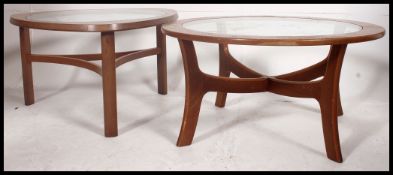 2 1970's retro teak wood Danish influence coffee tables of atomic / sputnik form,