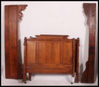 A late 19th century French oak France single bed  complete with head and footboard united by
