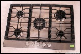 A Gas Hob having 5 burners running from gas canister and  Ex BBC Studio James Martin Show cooking