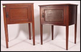 An Edwardian mahogany near pair of bedside cabinet raised on tapered legs with locker doors and