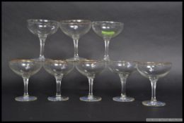 A collection of white fawn decorated vintage Babycham drinking glasses.