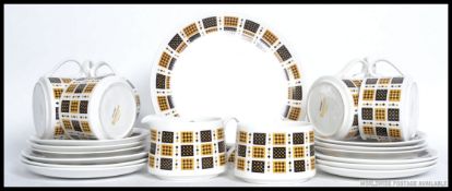 A retro fine bone china  tea service by Elixabethan in the ' Checkmate ' service consisting of six