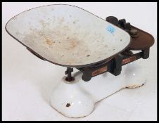 A vintage century Industrial pair of  white ' Avery ' shop scales food trough and weights.