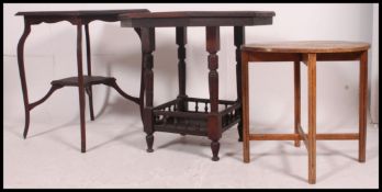 A Victorian mahogany centre table raised on shaped supports together with an Edwardian centre table