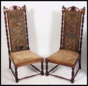 An excellent pair of Carolean design walnut high back chairs.