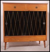 An excellent retro mid century red formica and smoked glass side / cocktail cabinet.
