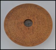 A Chinese wooden geomancer`s feng shui compass ? Of typical circular form with inset central