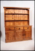 A 20th century country pine welsh dresser.