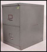 A retro 20th century Industrial metal 2 drawer office filing cabinet with notation slides and