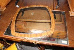 A collection of vintage and retro wall hanging mirrors,