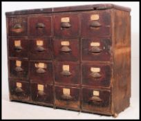 A stunning Victorian Industrial pine bank of twelve drawers,