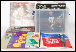 A collection of long play vinyl records of various genres to include  Earl Bostic, George Melly,