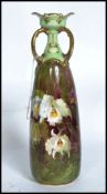 A Royal Doulton handpainted vase signed by David Dewsberry.